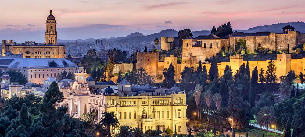 Malaga, Spain cityscape at the Cathedral, City Hall and Alcazaba citadel of Malaga.